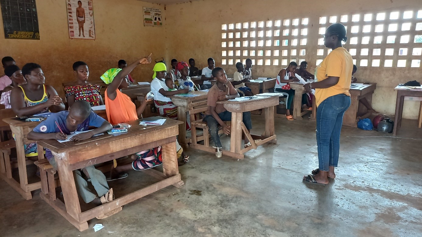 Community education session with participants at desks